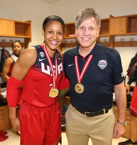 USA assistant coach Doug Bruno and tournament MVP Maya Moore after the USA won the FIBA World Championship gold-medal game.