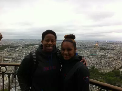 Chanise Jenkins (right) and Centrese McGee atop the Effiel Tower in Paris.