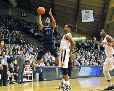Eli Cain scored 14 points to lead DePaul at Villanova on Tuesday.