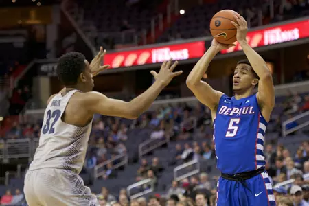 Feb 22, 2017; Washington, DC, USA; DePaul Blue Demons guard Billy Garrett Jr. (5) looks to pass in front of Georgetown Hoyas guard Kaleb Johnson (32) at Verizon Center. Mandatory Credit: Rafael Suanes-USA TODAY Sports