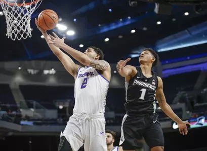Jan 12, 2018; Chicago, IL, USA; DePaul Blue Demons forward Jaylen Butz (2) goes to the basket against Providence Friars guard Makai Ashton-Langford (1) during the first half at Wintrust Arena. Mandatory Credit: Kamil Krzaczynski-USA TODAY Sports