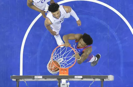 NEWARK, NJ - JANUARY 19: Femi Olujobi #25 of the DePaul Blue Demons dunks against the Seton Hall Pirates  at Prudential Center on January 19, 2019 in Newark, New Jersey. (Photo by Porter Binks)