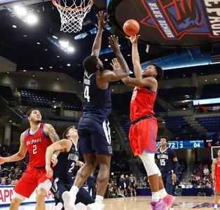 Femi Olujobi shoots against Villanova