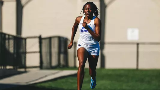 Rutendo Chimbaru running at Lane Stadium.