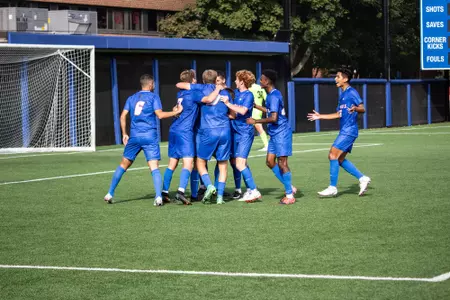 Men's soccer celebration