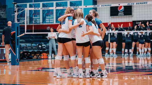 Volleyball Team Huddle