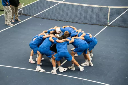 Men's tennis huddle