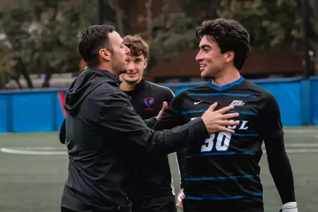 Coach Plotkin shares words with goalkeeper Santiago Davila