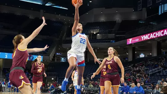 Anaya Peoples drives to the basket against Loyola.