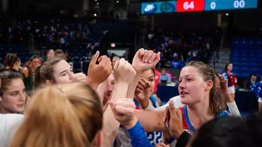 Team huddle after taking down Green Bay