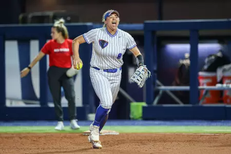 Brooke Johnson celebrates after a double play