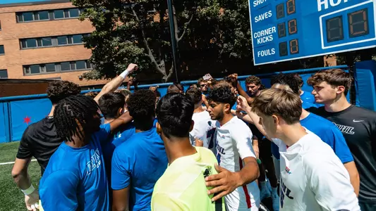 Men's Soccer Team Huddle