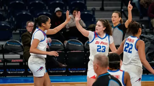 Charlece Ohiaeri and Michelle Sidor high five