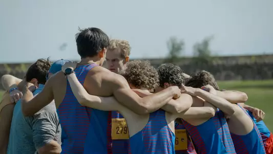 XC Men huddle