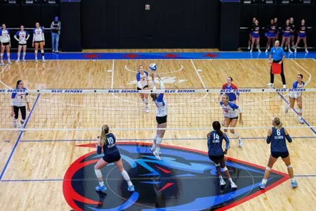 Amanda Saeger sets the ball at McGrath-Phillips Arena