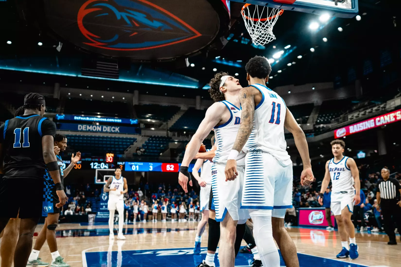 CJ Gunn and Conor Enright chest bump after a big play
