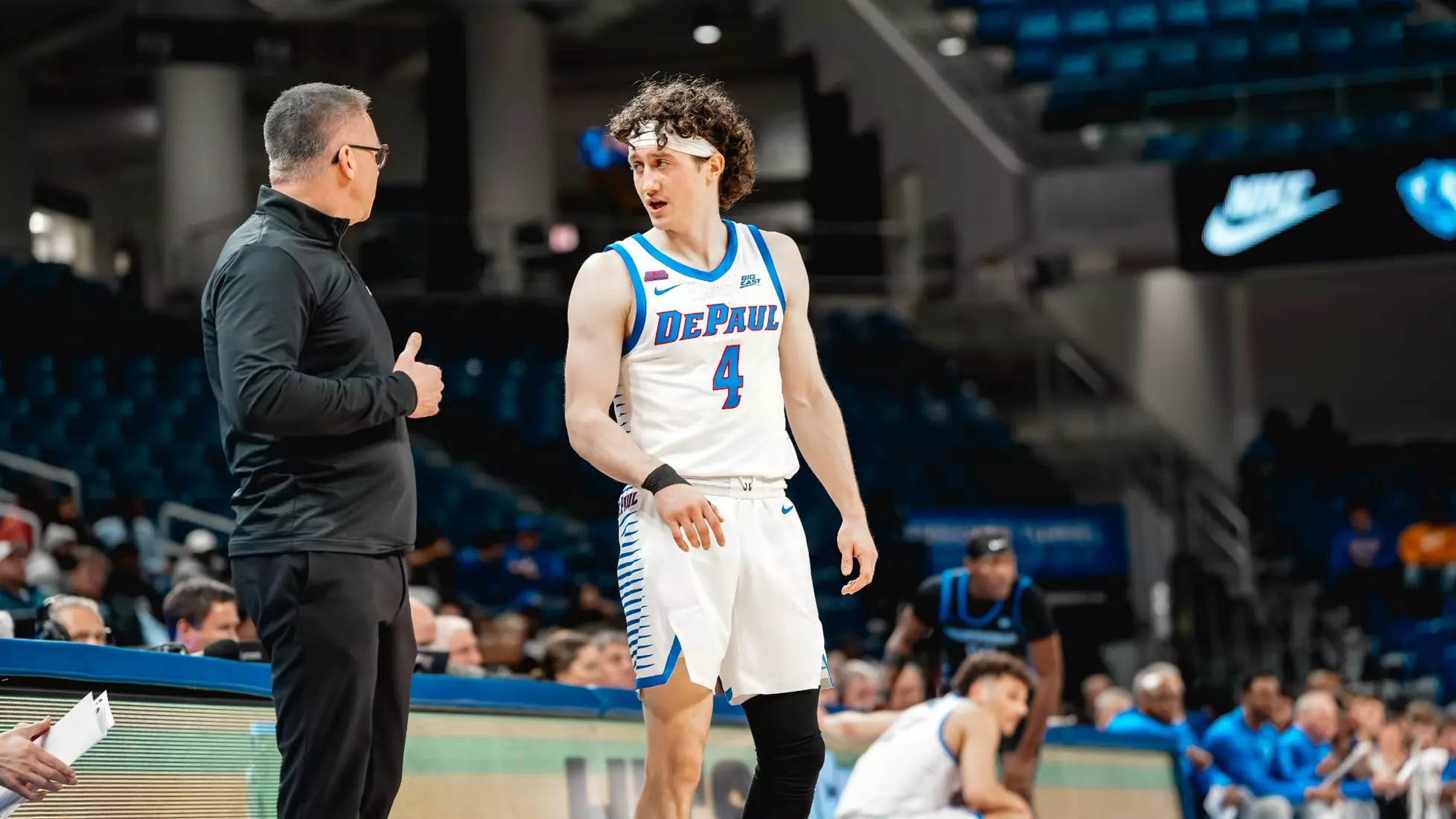 Conor Enright talks with Coach Holtmann