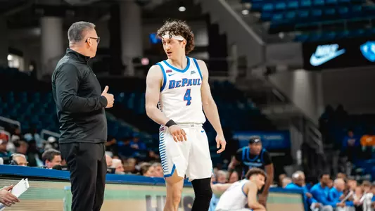 Conor Enright talks with Coach Holtmann