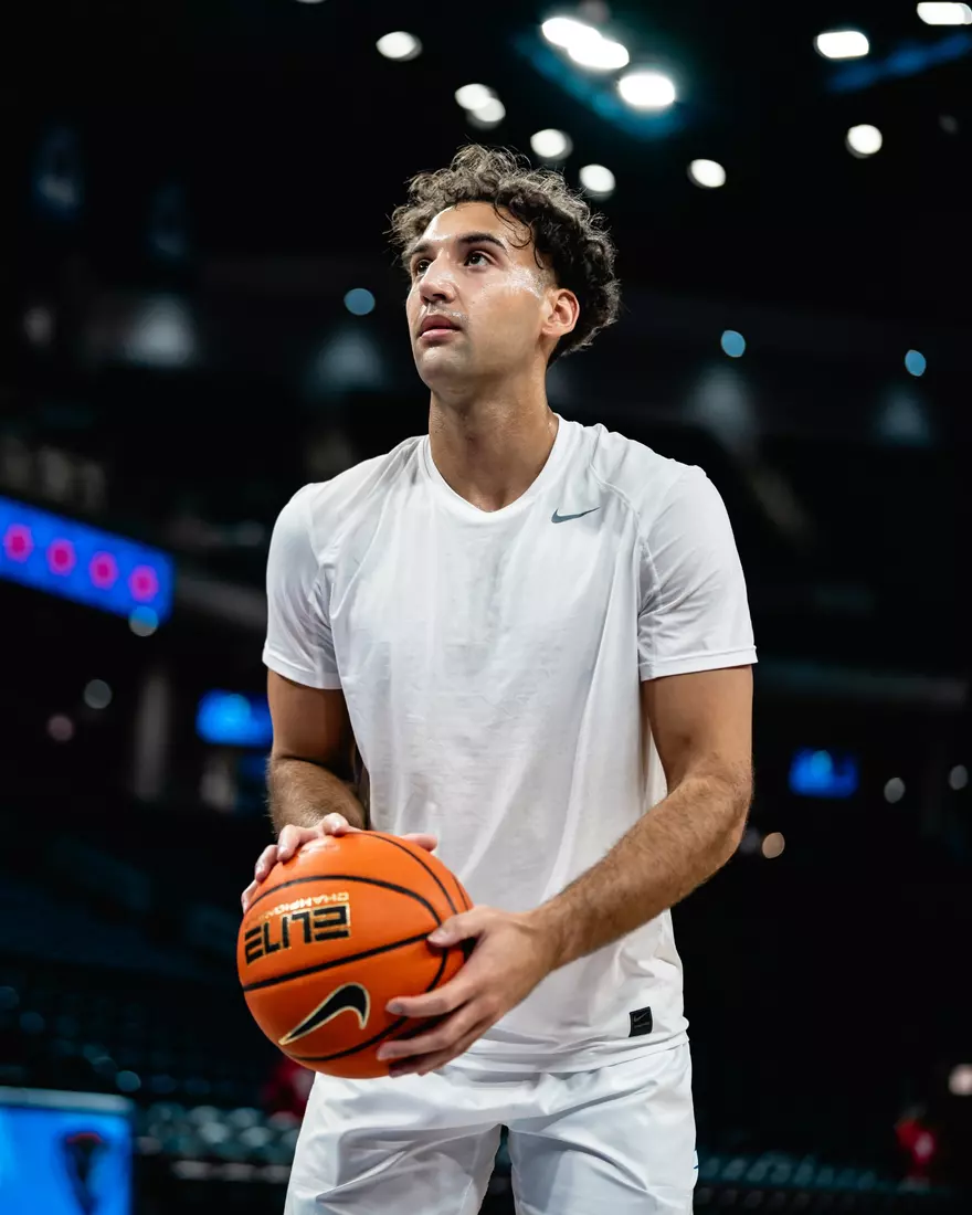 Isaiah Rivera looks for a shot in warm up