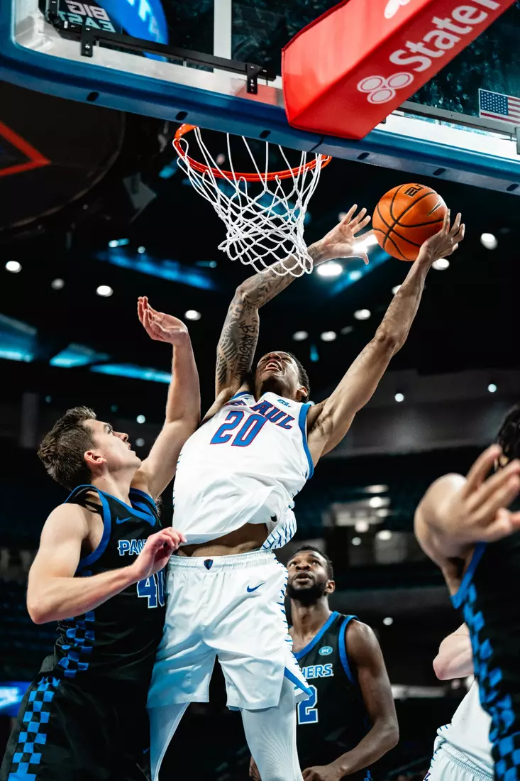 JJ Traynor goes up for a contested two-point shot