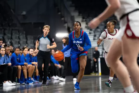 Sumer Lee dribbles the ball up the court against No. 8 Oklahoma.