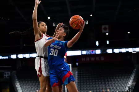 Angelina Smith puts up a layup against  No. 8 Oklahoma.