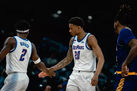 Layden Blocker and JJ Traynor high fives