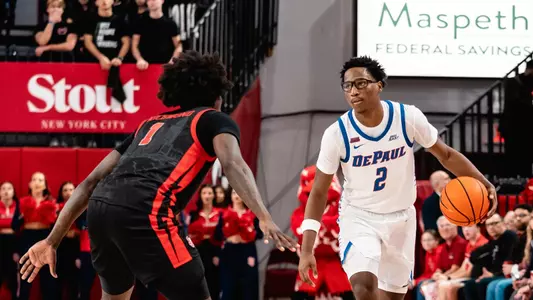 layden blocker dribbles the ball up the court