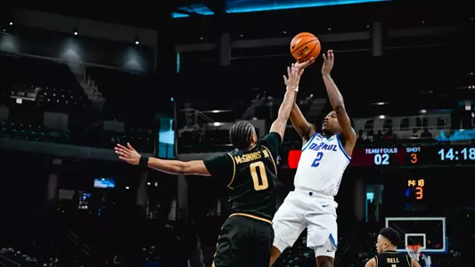 Layden Blocker leans back to put up a tough shot