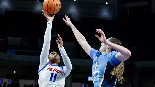 Sumer Lee drives to the basket against Marquette.