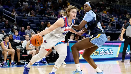 Jorie Allen drives to the basket against Marquette.