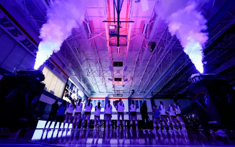 Team lines up to watch their introductory video