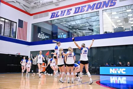 Team celebrates after winning the match