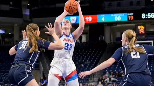 Jorie Allen pulls up for jumper in the paint.