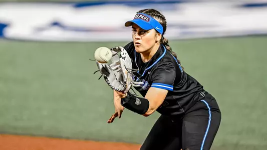 Baylee Cosgrove makes a catch in the infield
