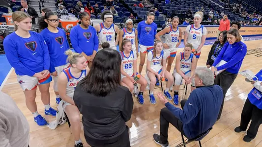 Doug Bruno guides team during timeout.
