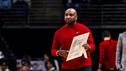 jack owens holding a whiteboard