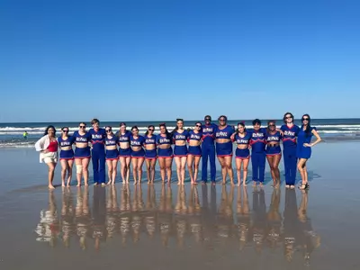 DePaul Cheer Team enjoys the beach after their NCA Nationals performance