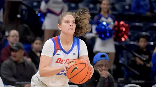Michelle Sidor readies to shoot against Loyola.