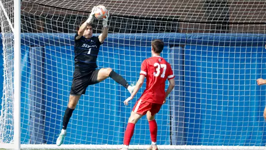 Santiago Davila makes a save