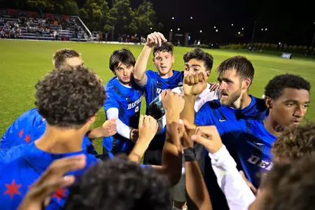 DePaul men's soccer huddle
