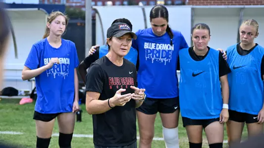 Coach O'Brien with team