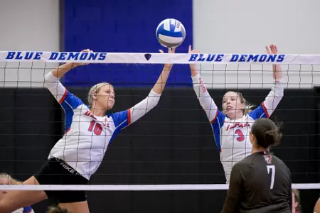Meghan Scholz and Jill Pressly at the net