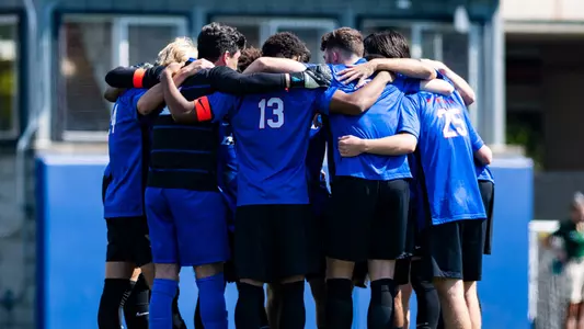 DePaul Soccer team huddle
