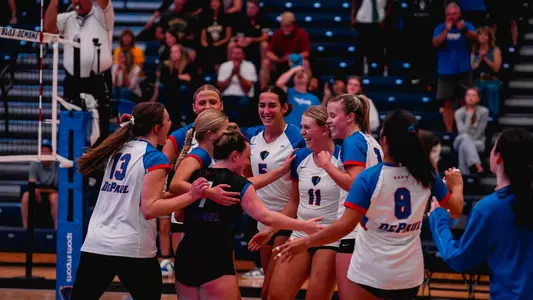 DePaul volleyball celebrates victory