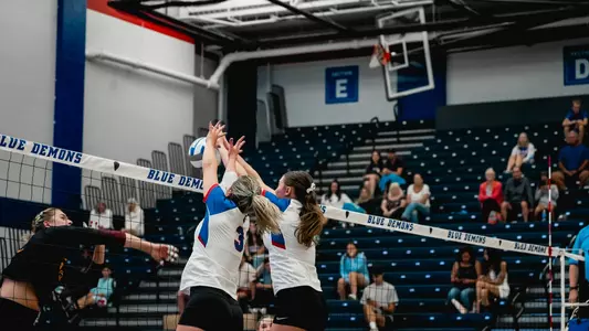 Jill Pressly and Aly Kindelberger block at net