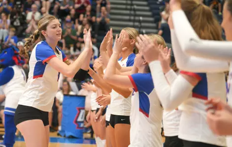 Grace Brooker in high-five line