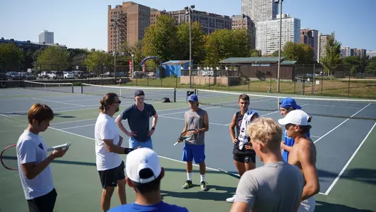 Men's tennis team huddle