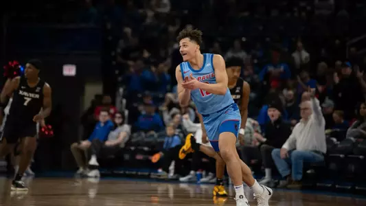 Jacob Meyer claps after a big play from his team