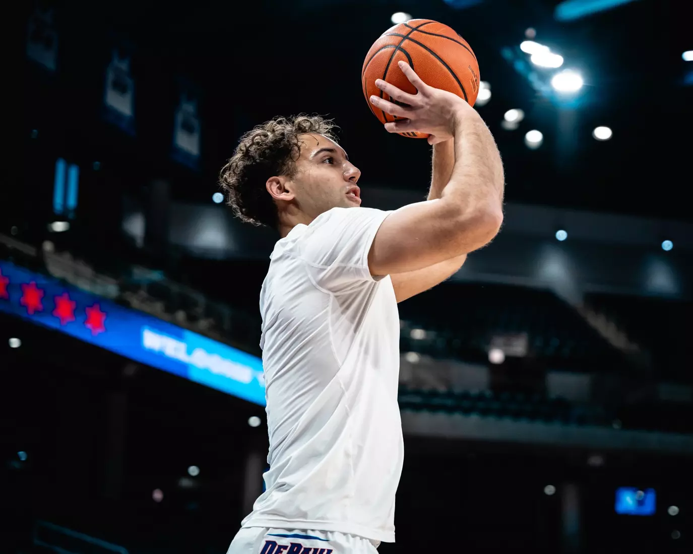 Isaiah Rivera shoots jumper in warmups.